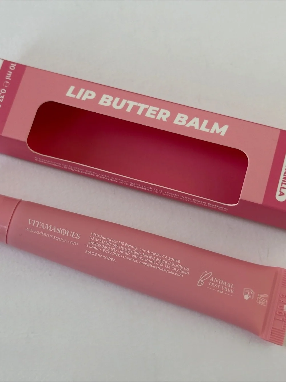 Vitamasques Plump & Repair Tinted Lip Butter Balm in Pink Vanilla. 10 mL / 0.33.
